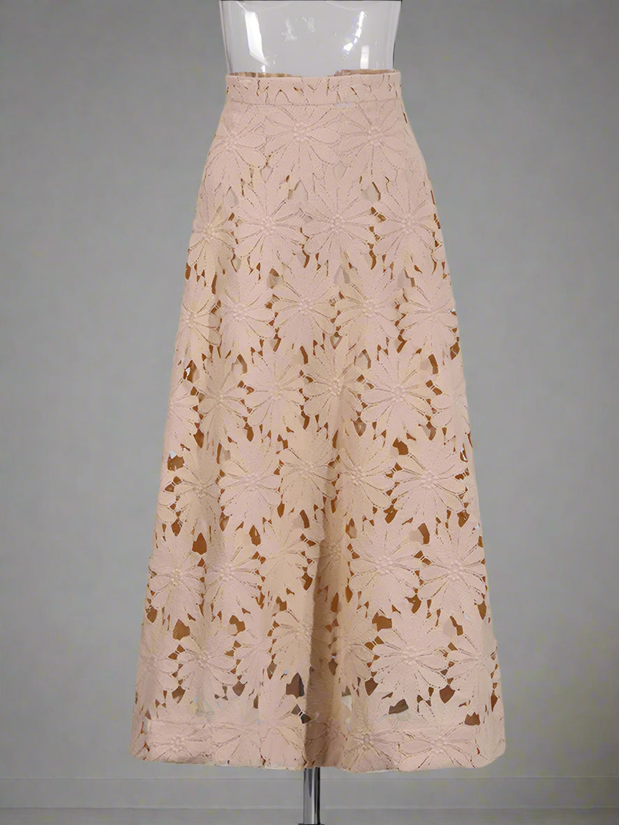 Beige lace skirt on a mannequin against a white background