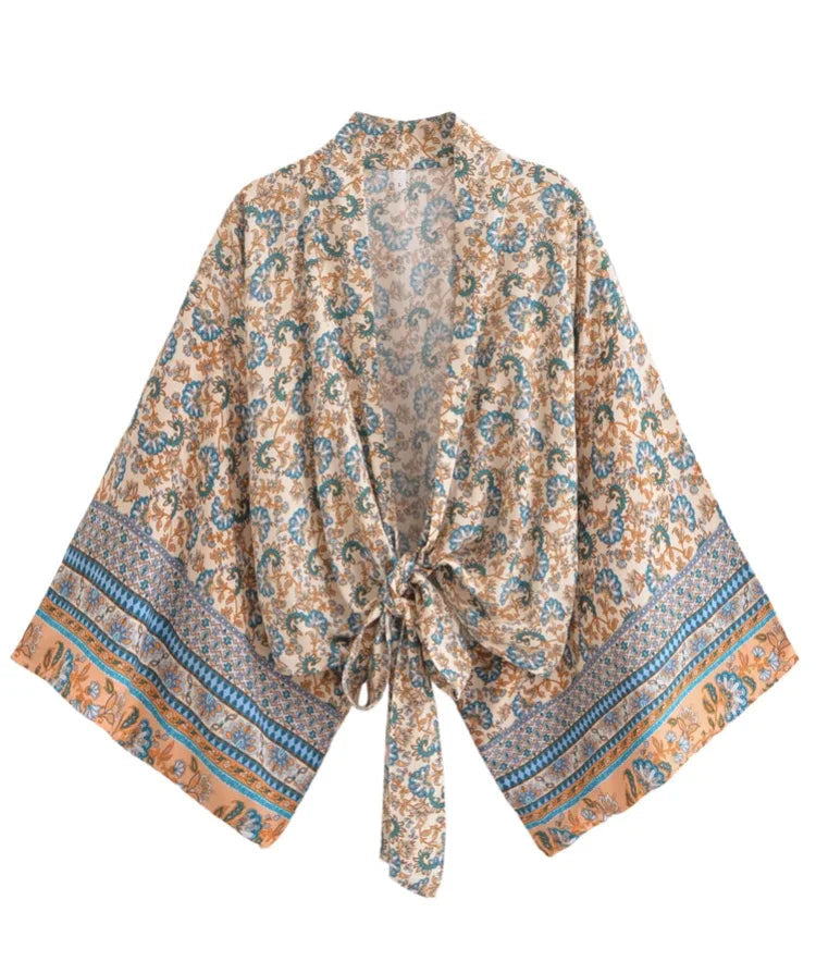 Patterned robe with a tie waist on a white background