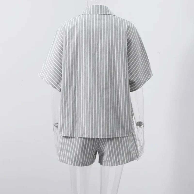 Striped shirt and shorts set on a white background